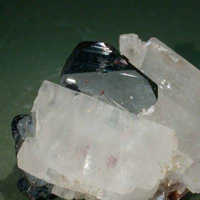 Specular hematite on rhombohedral crystals of white magnesite, from Bahia, Brazil